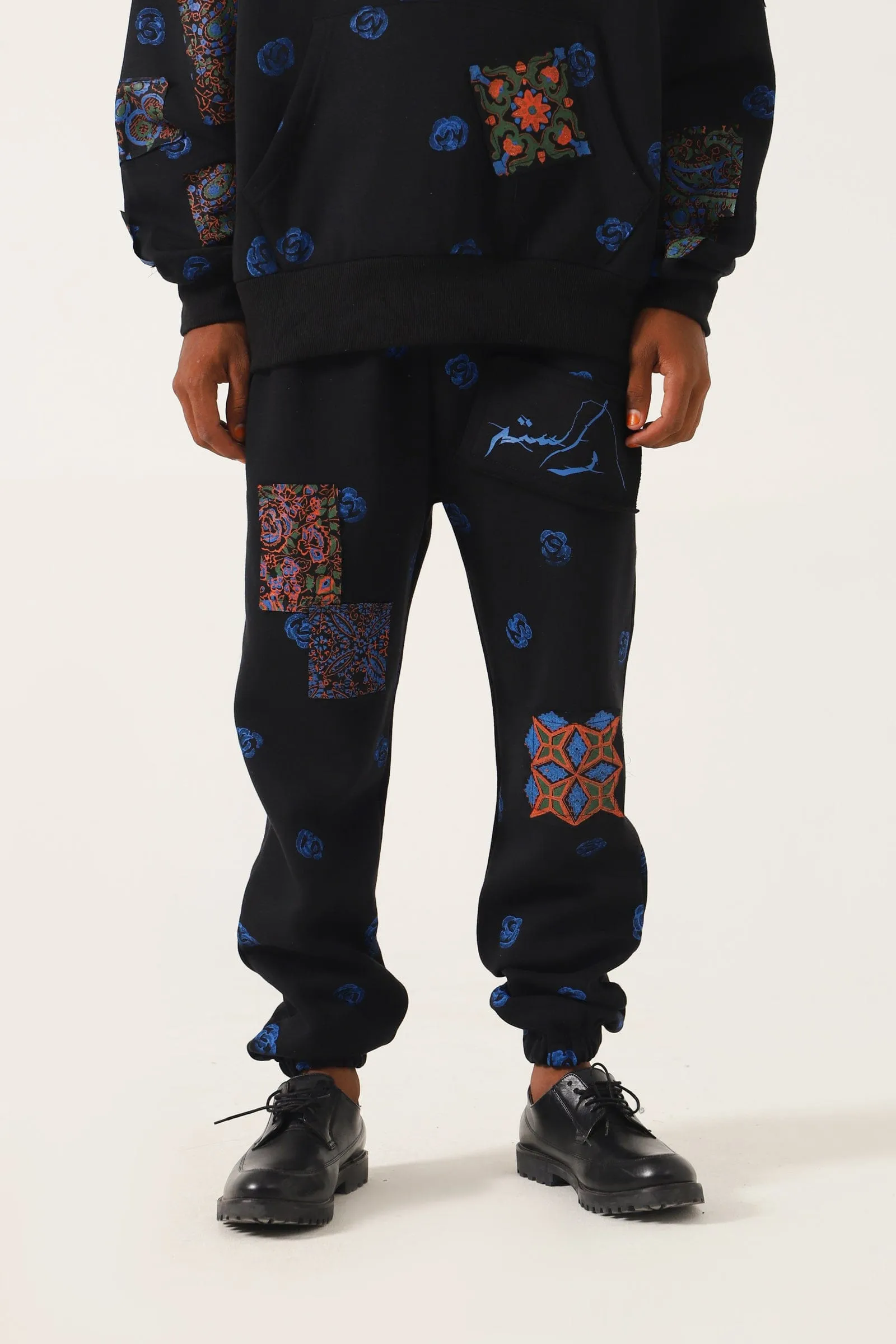 PATCHWORK BLOCK PRINT SWEATPANTS