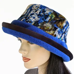 Premium Fashion Hat in royal with floral velvet trim, wide brim and earflap